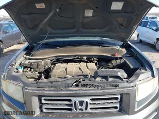 2007 Honda Ridgeline RTL w/Leather with VIN 2HJYK16547H526249, listed as a IAAI auction lot 41769625 with 173,168 mi miles. Bid and sale history available at carsss.com. Image 10.