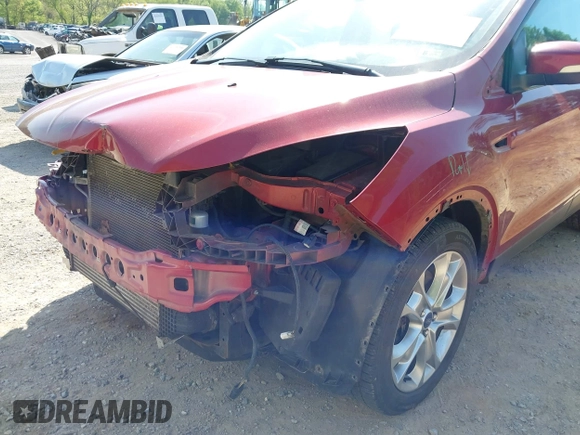 2013 Ford Escape SEL with VIN 1FMCU9H91DUD65144, listed as a IAAI auction lot 42124589 with 221,631 mi miles and . Bid and sale history available at DreamBid. Image 14.