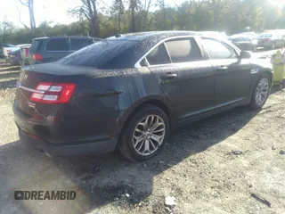 2014 Ford Taurus Limited with VIN 1FAHP2F80EG101504, listed as a IAAI auction lot 40974783 with 177,522 mi miles. Bid and sale history available at carsss.com. Image 4.