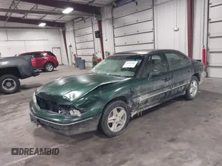 1997 Pontiac Bonneville SE z VIN 1G2HX52KXVH250272, wystawiony jako IAAI lot #41644041 z przebiegiem 160 791 mil mil oraz . Historia ofert i sprzedaży dostępna na DreamBid. Obrazek 2.