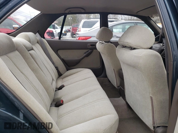 1994 Toyota Camry LE z VIN 4T1GK12E9RU063977, wystawiony jako Copart lot #47723075 z przebiegiem 74 854 mil mil oraz Czysty tytuł • Clean title. Historia ofert i sprzedaży dostępna na DreamBid. Obrazek 10.
