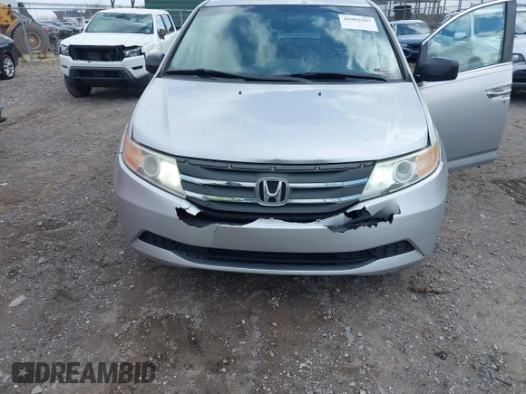 2011 Honda Odyssey EX-L with VIN 5FNRL5H60BB012206, listed as a IAAI auction lot 41982987 with 220,913 mi miles and . Bid and sale history available at carsss.com. Image 6.
