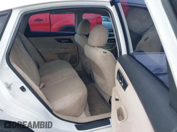 2014 Nissan Altima SV with VIN 1N4AL3AP9EN232475, listed as a IAAI auction lot 42136961 with 86,720 mi miles and . Bid and sale history available at DreamBid. Image 8.