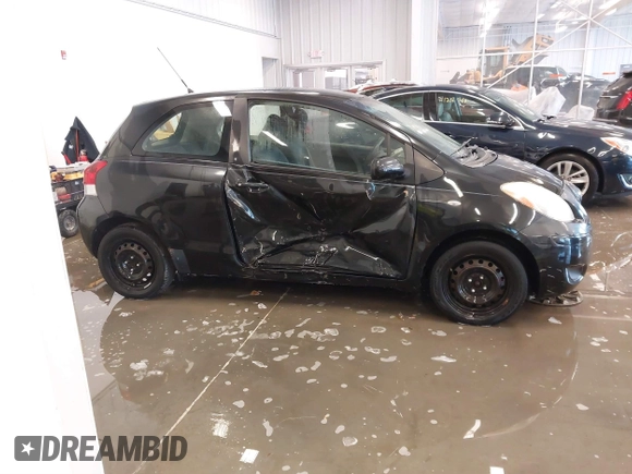 2011 Toyota Yaris with VIN JTDJT4K3XB5327229, listed as a IAAI auction lot 41275717 with 140,276 mi miles. Bid and sale history available at carsss.com. Image 13.