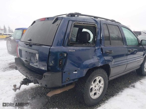 2001 Jeep Grand Cherokee Laredo with VIN 1J4GW48N21C730703, listed as a IAAI auction lot 41581667 with 111,054 mi miles. Bid and sale history available at carsss.com. Image 6.