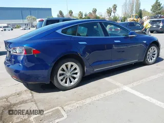 2016 Tesla Model S 90D with VIN 5YJSA1E25GF157220, listed as a IAAI auction lot 42003019 with 130,540 mi miles and . Bid and sale history available at DreamBid. Image 4.