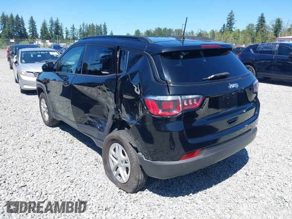 2018 Jeep Compass Sport with VIN 3C4NJDAB1JT261863, listed as a IAAI auction lot 42677037 with 93,263 mi miles and . Bid and sale history available at DreamBid. Image 3.