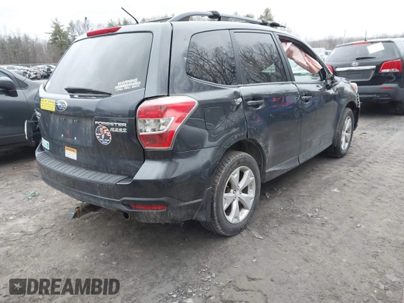 2015 Subaru Forester 2.5i Premium with VIN JF2SJADC7FG511867, listed as a IAAI auction lot 41842990 with 136,696 mi miles. Bid and sale history available at carsss.com. Image 4.