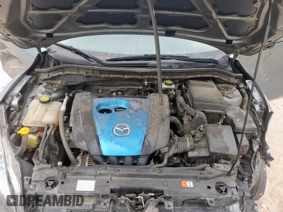 2012 Mazda 3 i Touring z VIN JM1BL1L70C1580749, wystawiony jako Copart lot #58774145 z przebiegiem 147 890 mil mil oraz Szkoda całkowita • Salvage title. Historia ofert i sprzedaży dostępna na DreamBid. Obrazek 11.