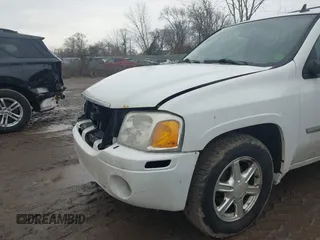 2008 GMC Envoy SLE2 with VIN 1GKDT13S582112468, listed as a IAAI auction lot 41686605 with 215,163 mi miles. Bid and sale history available at carsss.com. Image 6.