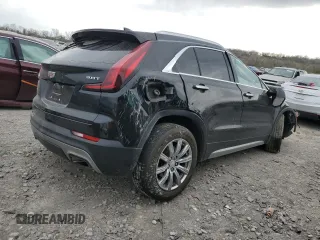 2019 Cadillac XT4 AWD Premium Luxury с VIN 1GYFZDR4XKF117964, выставлен на аукционе Copart как лот 52339265 с пробегом 99 840 миль миль и Списание • Salvage title. История ставок и продаж доступна на DreamBid. Изображение 3.