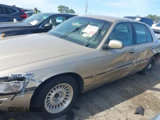 2000 Mercury Grand Marquis LS z VIN 2MEFM75W5YX627647, wystawiony jako IAAI lot #42072795 z przebiegiem 188 113 mil mil oraz . Historia ofert i sprzedaży dostępna na DreamBid. Obrazek 6.