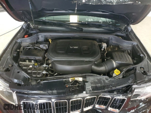 2016 Jeep Grand Cherokee Laredo z VIN 1C4RJFAG1GC472137, wystawiony jako Copart lot #56153775 z przebiegiem 103 384 mil mil oraz Szkoda całkowita • Salvage title. Historia ofert i sprzedaży dostępna na DreamBid. Obrazek 12.