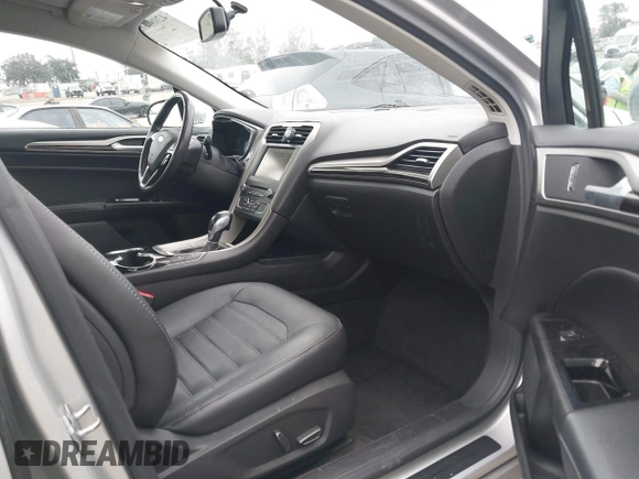 2016 Ford Fusion Energi SE Luxury with VIN 3FA6P0PU9GR357076, listed as a IAAI auction lot 42081615 with 174,234 mi miles. Bid and sale history available at carsss.com. Image 5.