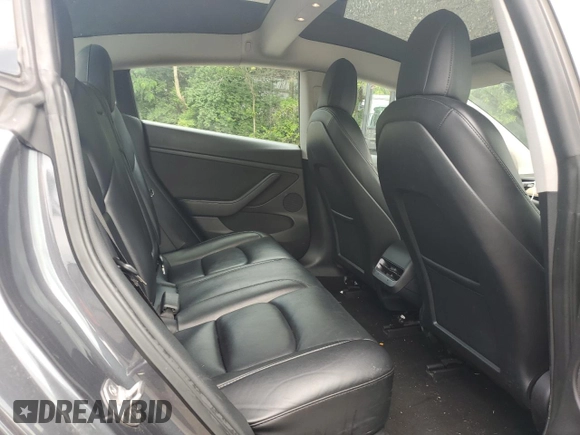 2022 Tesla Model 3 z VIN 5YJ3E1EA6NF185895, wystawiony jako Copart lot #60165405 z przebiegiem 190 572 mil mil oraz Czysty tytuł • Clean title. Historia ofert i sprzedaży dostępna na DreamBid. Obrazek 10.