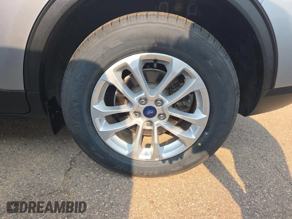 2022 Ford Escape SE z VIN 1FMCU0G61NUB33373, wystawiony jako IAAI lot #42791529 z przebiegiem 56 067 mil mil oraz . Historia ofert i sprzedaży dostępna na DreamBid. Obrazek 25.