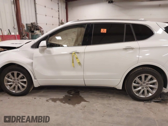 2019 Buick Envision Essence with VIN LRBFXCSA1KD033015, listed as a IAAI auction lot 41889135 with 43,417 mi miles and . Bid and sale history available at carsss.com. Image 14.