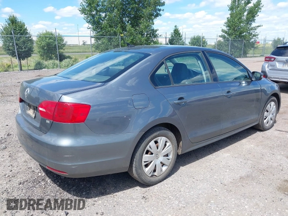 2014 Volkswagen Jetta SE z VIN 3VWD17AJ8EM286230, wystawiony jako IAAI lot #42735736 z przebiegiem 181 617 mil mil oraz . Historia ofert i sprzedaży dostępna na DreamBid. Obrazek 4.