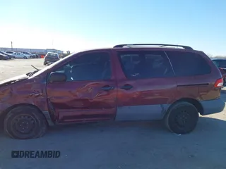 2002 Toyota Sienna CE with VIN 4T3ZF19C52U463405, listed as a IAAI auction lot 41658109 with 138,726 mi miles. Bid and sale history available at carsss.com. Image 14.