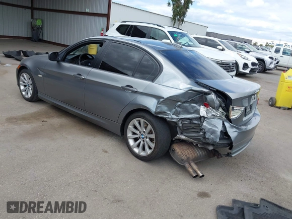 2011 BMW 3 Series 328i with VIN WBAPH5G52BNM84035, listed as a IAAI auction lot 42046301 with 165,418 mi miles. Bid and sale history available at carsss.com. Image 3.