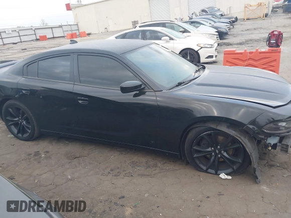 2018 Dodge Charger SXT Plus with VIN 2C3CDXHG3JH323343, listed as a IAAI auction lot 41948905 with 158,543 mi miles and . Bid and sale history available at carsss.com. Image 14.