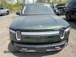 2024 Rivian R1T Adventure z VIN 7FCTGCAA1RN030829, wystawiony jako Copart lot #55557565 z przebiegiem Nie podano mil oraz Szkody całkowita. Historia ofert i sprzedaży dostępna na DreamBid. Obrazek 5.