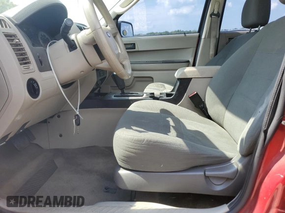 2009 Ford Escape XLS with VIN 1FMCU02739KA51016, listed as a Copart auction lot 63267285 with 152,559 mi miles and Salvage title. Bid and sale history available at DreamBid. Image 7.