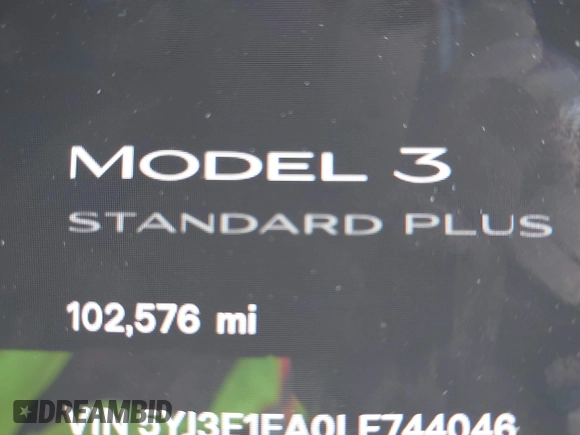 2020 Tesla Model 3 Standard Range Plus with VIN 5YJ3E1EA0LF744046, listed as a IAAI auction lot 41939894 with 102,576 mi miles. Bid and sale history available at carsss.com. Image 15.