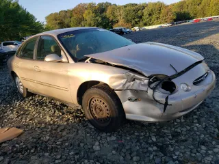 1999 Ford Taurus SE z VIN 1FAFP53U9XG107489, wystawiony jako Copart lot #69576093 z przebiegiem 86 262 mil mil oraz Szkody całkowita. Historia ofert i sprzedaży dostępna na DreamBid. Obrazek 4.