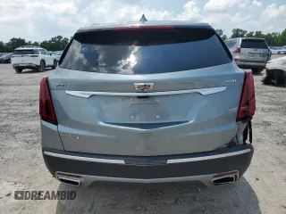2023 Cadillac XT5 FWD Premium Luxury with VIN 1GYKNCRS3PZ135585, listed as a Copart auction lot 58891914 with 32,325 mi miles and Salvage Title. Bid and sale history available at carsss.com. Image 6.