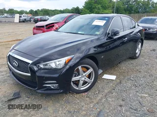 2015 Infiniti Q50 z VIN JN1BV7AR2FM421111, wystawiony jako IAAI lot #42209282 z przebiegiem 128 481 mil mil oraz . Historia ofert i sprzedaży dostępna na DreamBid. Obrazek 16.
