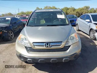 2009 Honda CR-V EX with VIN JHLRE38599C007909, listed as a IAAI auction lot 42077656 with 223,597 mi miles and . Bid and sale history available at carsss.com. Image 12.