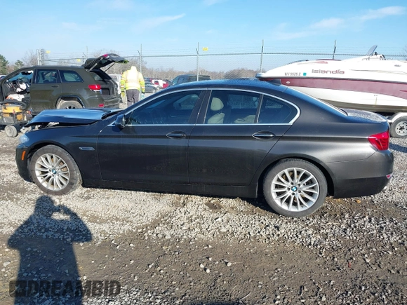 2014 BMW 5 Series 528i xDrive with VIN WBA5A7C54ED616297, listed as a IAAI auction lot 41877809 with 147,874 mi miles and . Bid and sale history available at DreamBid. Image 14.