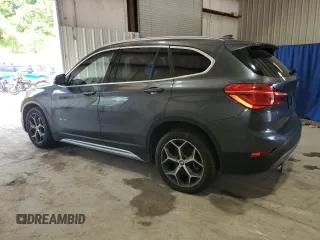 2017 BMW X1 xDrive28i with VIN WBXHT3C34H5F84621, listed as a Copart auction lot 63252115 with 95,170 mi miles and Clean title. Bid and sale history available at DreamBid. Image 2.