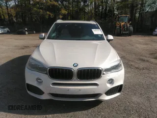 2014 BMW X5 xDrive35i with VIN 5UXKR0C56E0H18800, listed as a IAAI auction lot 40843200 with 129,991 mi miles. Bid and sale history available at carsss.com. Image 12.