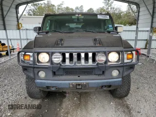 2003 Hummer H2 with VIN 5GRGN23U33H118459, listed as a Copart auction lot 77765694 with 157,390 mi miles and Salvage Title. Bid and sale history available at carsss.com. Image 5.
