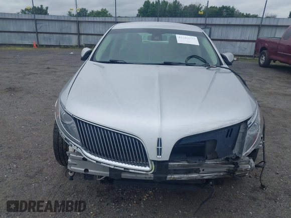2013 Lincoln MKS с VIN 1LNHL9DK3DG604712, выставлен на аукционе IAAI как лот 42351237 с пробегом 144 927 миль миль и . История ставок и продаж доступна на DreamBid. Изображение 6.