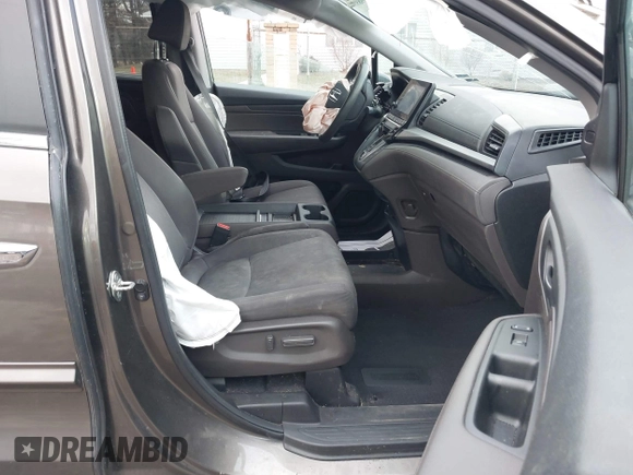 2019 Honda Odyssey EX with VIN 5FNRL6H50KB097304, listed as a IAAI auction lot 41659899 with 128,641 mi miles. Bid and sale history available at carsss.com. Image 5.