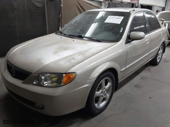2001 Mazda Protege LX with VIN JM1BJ226710470935, listed as a IAAI auction lot 41577385 with 235,128 mi miles. Bid and sale history available at carsss.com. Image 17.