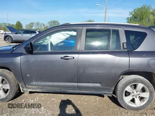 2017 Jeep Compass Sport SE z VIN 1C4NJDBB9HD143154, wystawiony jako IAAI lot #42126726 z przebiegiem 219 850 mil mil oraz . Historia ofert i sprzedaży dostępna na DreamBid. Obrazek 14.