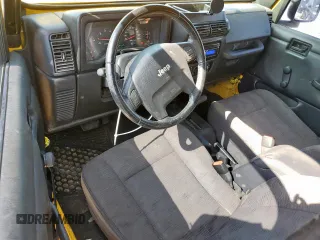2003 Jeep Wrangler Sport with VIN 1J4FA49S43P369906, listed as a Copart auction lot 58079235 with 139,547 mi miles and Salvage title. Bid and sale history available at DreamBid. Image 8.