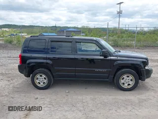 2013 Jeep Patriot Sport with VIN 1C4NJRBB6DD123791, listed as a IAAI auction lot 42202821 with 123,809 mi miles and . Bid and sale history available at DreamBid. Image 14.