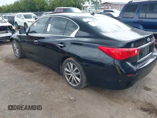 2014 Infiniti Q50 Premium z VIN JN1BV7AP9EM690929, wystawiony jako IAAI lot #39916709 z przebiegiem Nie podano mil oraz . Historia ofert i sprzedaży dostępna na DreamBid. Obrazek 3.