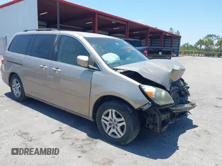 2005 Honda Odyssey EX with VIN 5FNRL38495B401742, listed as a IAAI auction lot 42133434 with 162,161 mi miles and . Bid and sale history available at carsss.com. Image 1.