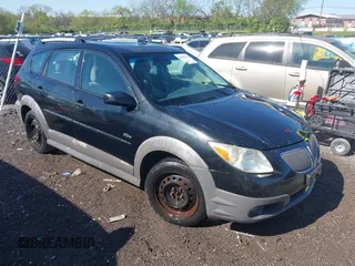 2007 Pontiac Vibe with VIN 5Y2SL65867Z405643, listed as a IAAI auction lot 42049184 with 297,523 mi miles. Bid and sale history available at carsss.com. Image 1.