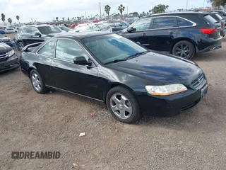 1999 Honda Accord EX z VIN 1HGCG2254XA022909, wystawiony jako IAAI lot #41557304 z przebiegiem 238 197 mil mil oraz . Historia ofert i sprzedaży dostępna na DreamBid. Obrazek 1.