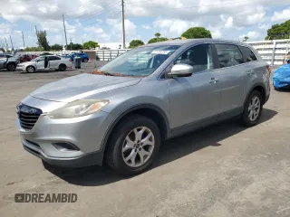 2014 Mazda CX-9 Touring z VIN JM3TB2CAXE0432939, wystawiony jako Copart lot #61464265 z przebiegiem 136 218 mil mil oraz Czysty tytuł • Clean title. Historia ofert i sprzedaży dostępna na DreamBid. Obrazek 1.