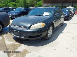 2014 Chevrolet Impala LT with VIN 2G1WB5E31E1106255, listed as a IAAI auction lot 41960424 with 235,070 mi miles and . Bid and sale history available at DreamBid. Image 2.