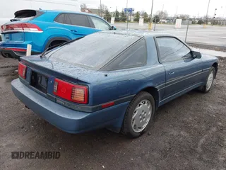 1986 Toyota Supra z VIN JT2MA70L1G0003588, wystawiony jako IAAI lot #41947537 z przebiegiem 110 979 mil mil oraz . Historia ofert i sprzedaży dostępna na DreamBid. Obrazek 4.
