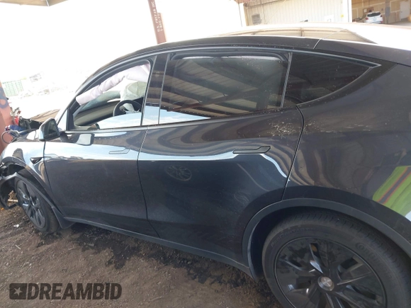 2024 Tesla Model Y with VIN 7SAYGDED9RF053203, listed as a IAAI auction lot 41906729 with Not Provided miles and . Bid and sale history available at DreamBid. Image 14.